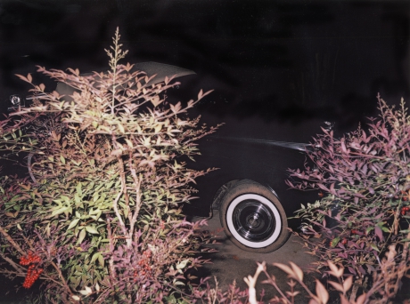William Eggleston - Car wheel at night 
